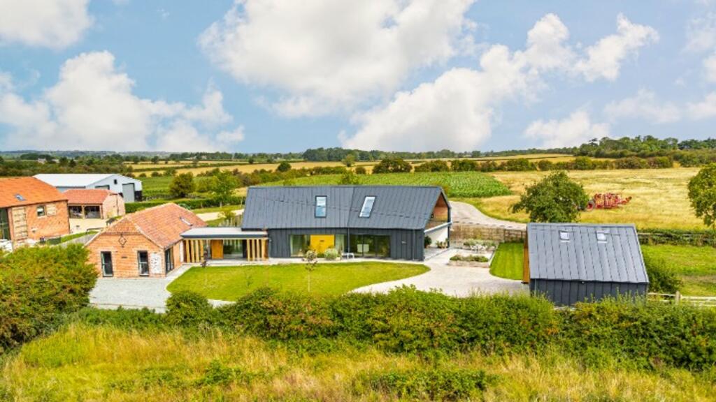 Main image of property: Beautifully Converted Barn | Four Bedrooms | Rural Setting