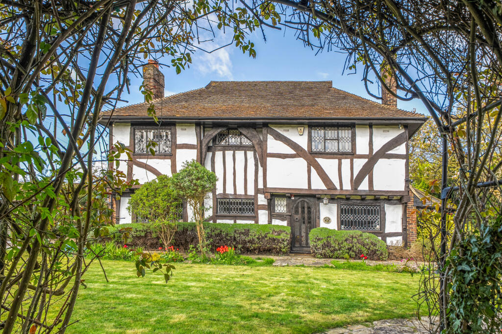 Main image of property: Woodcote Close, Epsom, KT18