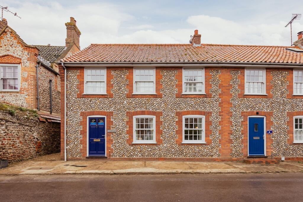 Main image of property: Charming Cottage in Cley