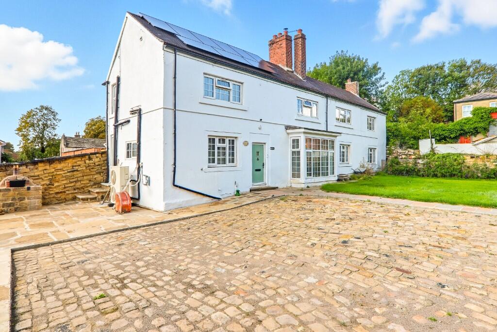 Main image of property: India Cottage, Bank Avenue, Morley