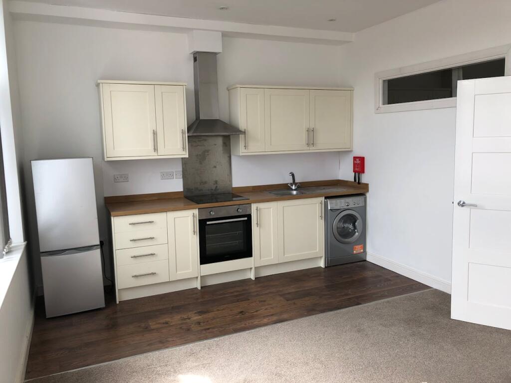 Main image of property: Flat 2, Burton Apartments, 21a St. Sepulchre Gate, Doncaster, DN1 1TD