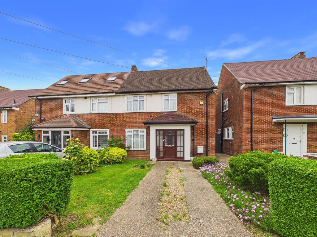 Main image of property: Coombe Drive, Ruislip, HA4