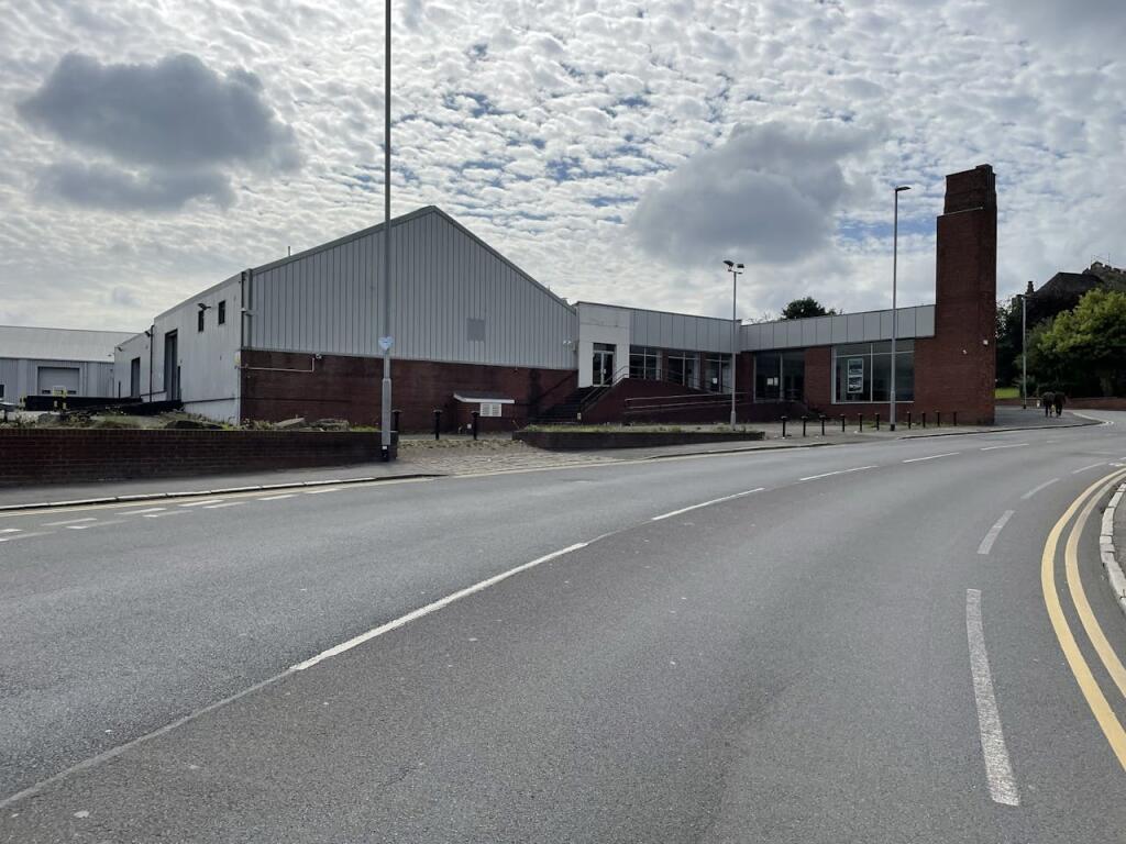 Main image of property: Former Land Rover Showroom, Victoria Square, Broad Street, Hanley, Stoke-on-Trent, ST1 4JH
