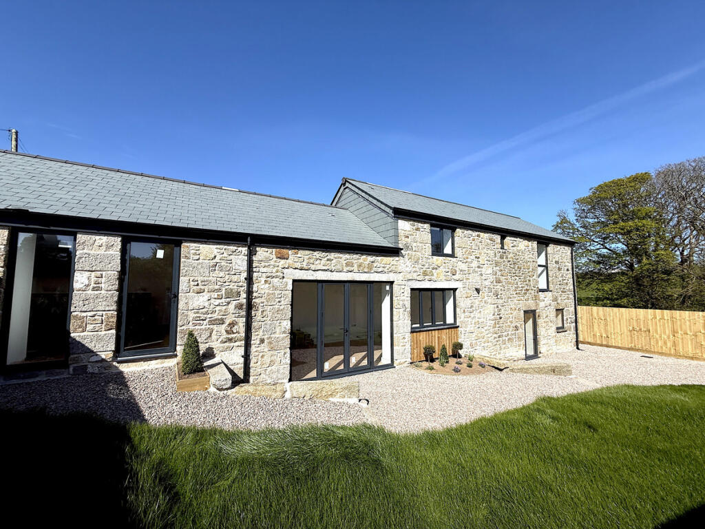 Main image of property: Beautifully crafted detached barn conversion, Helston