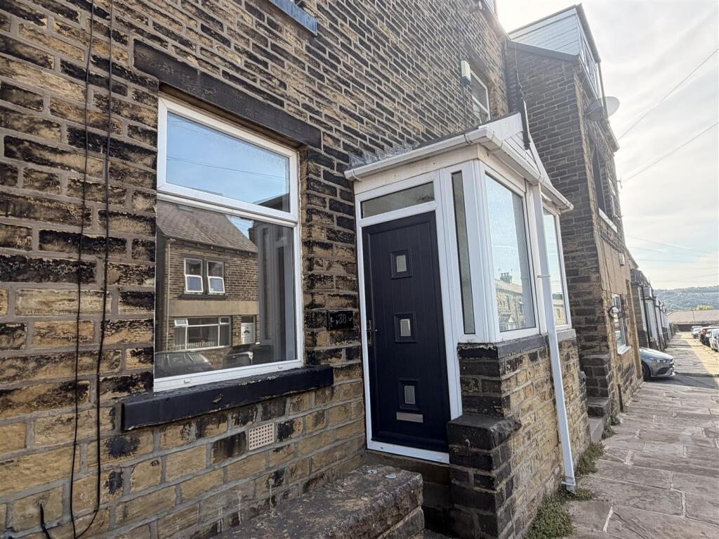 Main image of property: Woodside Place, Halifax, HX3 6EQ