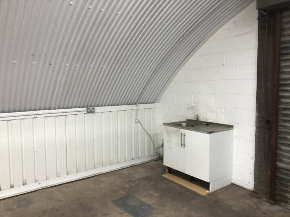 An empty arch with white lining