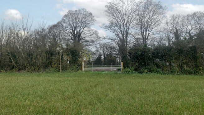 Access is from a gate just to the east.