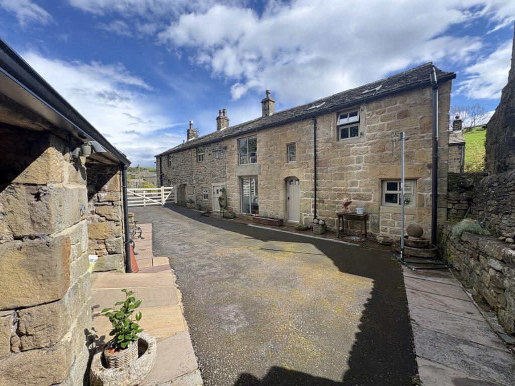Main image of property: Detached House with Land & Building For Sale – Starkie Heaton Farm, Ickornshaw, Cowling, BD22 0DE