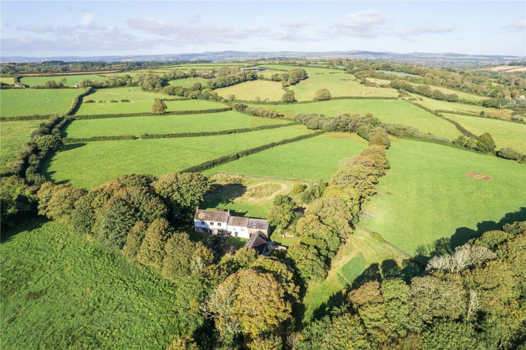 one acre smallholding in popular area, great location, polytunnel. in need of some modernising, great potential, barns