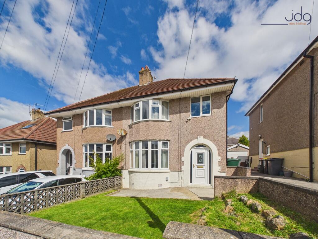 Main image of property: Ashton Drive | A well-presented semi with generous living space and low-maintenance garden