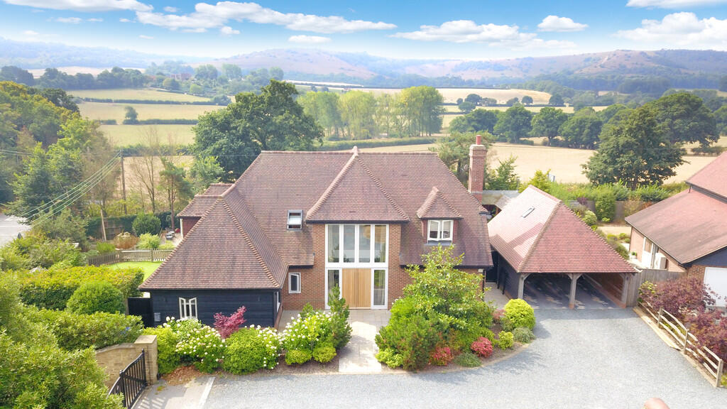 Main image of property: Storrington - superb detached home