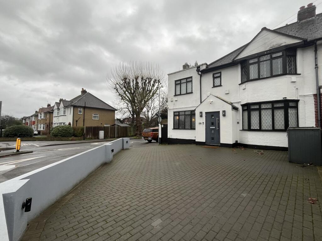 Main image of property: Bridge Road, Chessington, Surrey. KT9 2EX