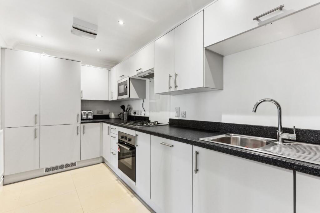 Main image of property: Wood Court,
Heathstan Road, W12