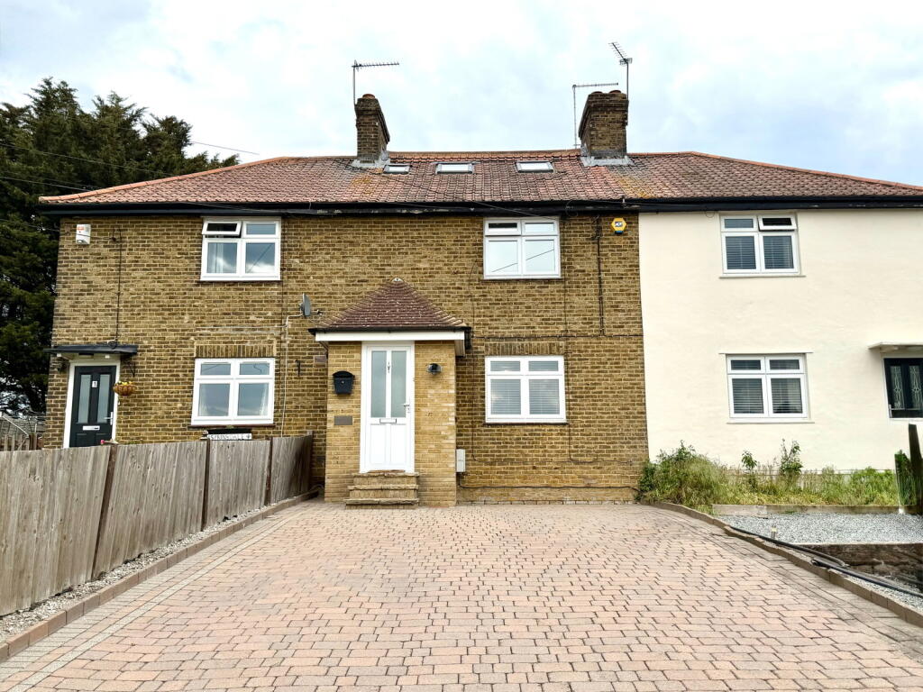 Main image of property: A Deceptively Spacious & Extended Family Home With Countryside Surroundings
