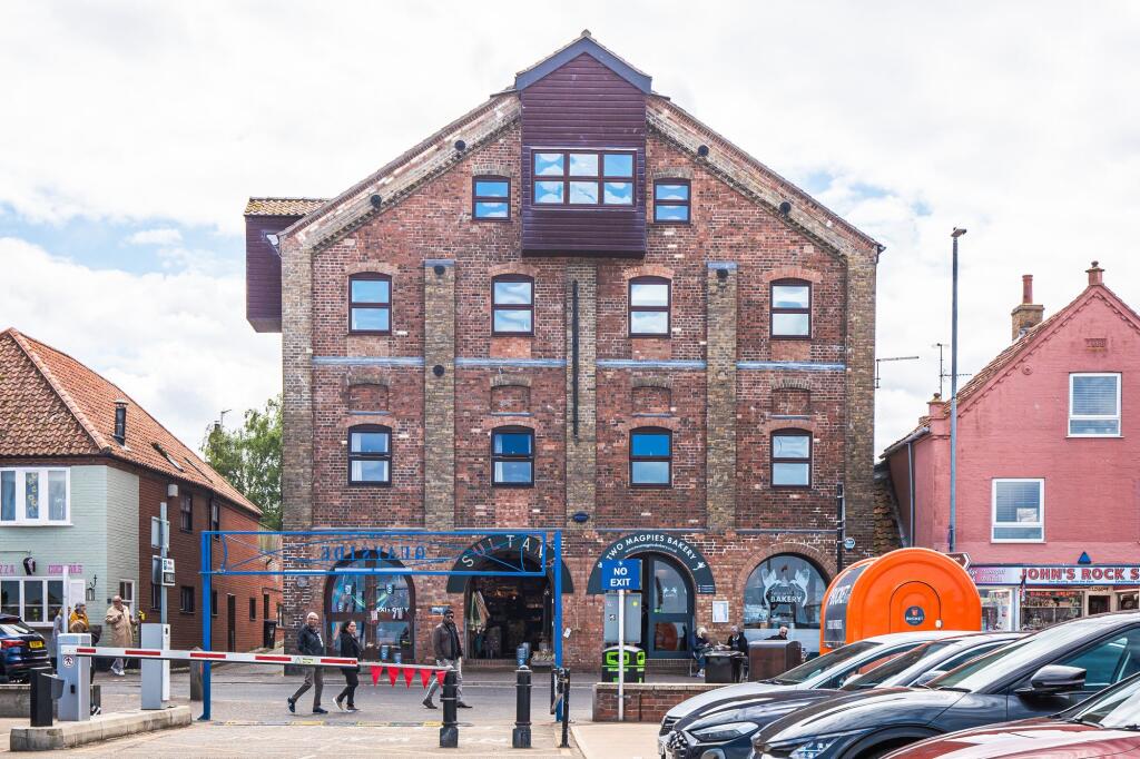 Main image of property: Wells-next-the-Sea Apartment with Harbour Views and a Prime Quay-Front Location