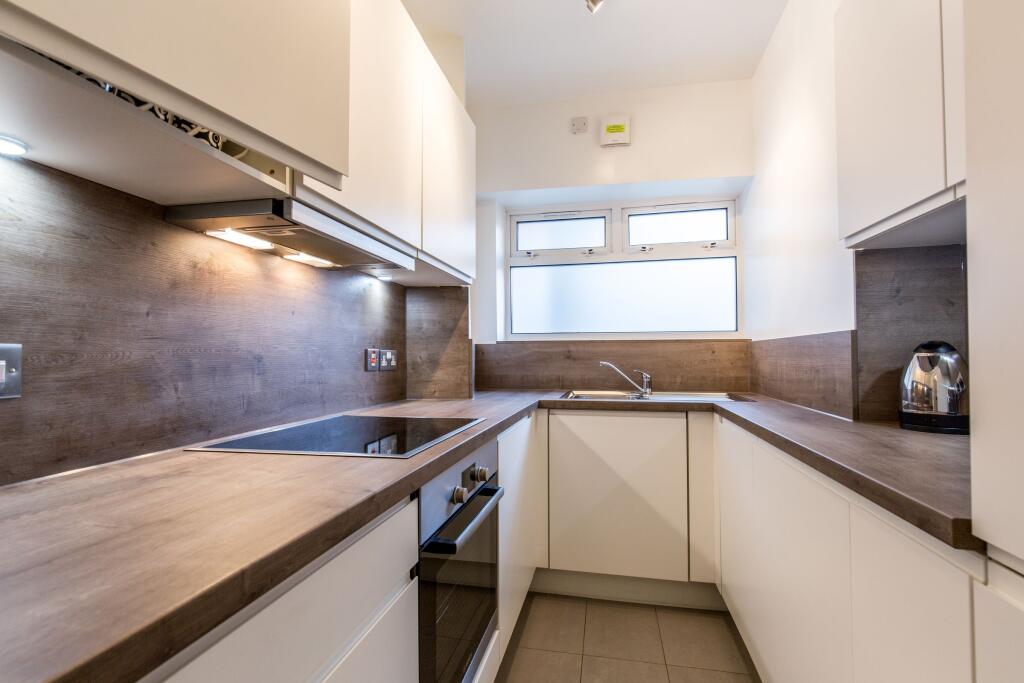 Main image of property: 2 Brondesbury Court 235 Willesden Lane