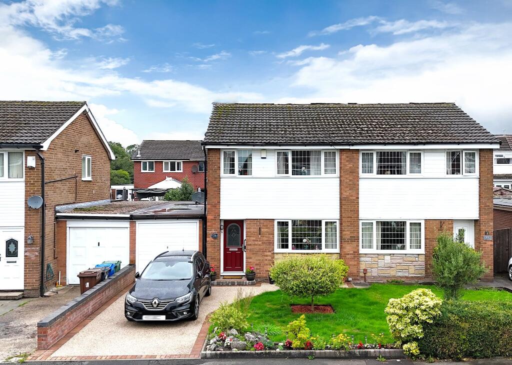 Main image of property: Crediton Drive, Platt Bridge, Wigan, WN2 5HH