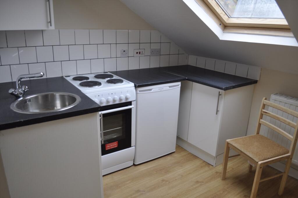 Main image of property: 2 Wolverton Gardens, London, W6