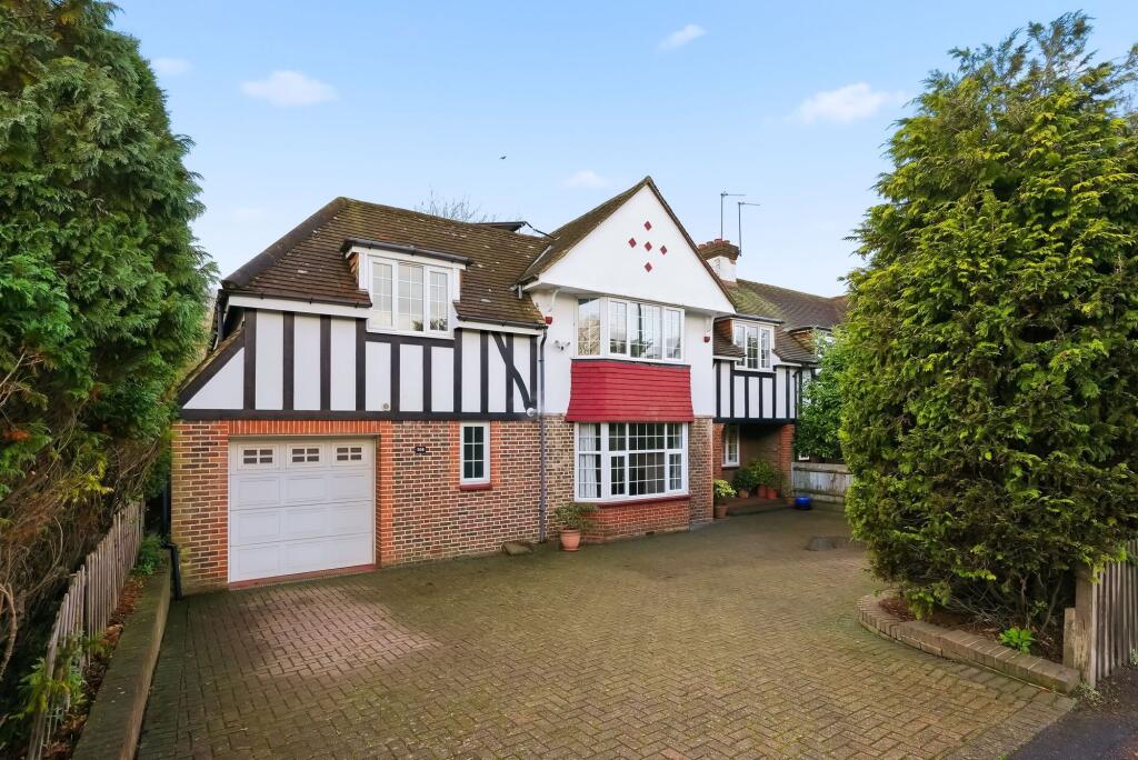 Main image of property: Reigate Road, Epsom, KT17