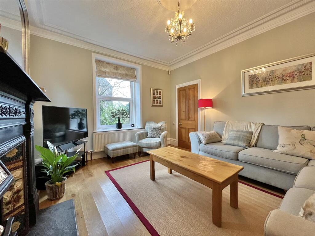 Drawing room with cast-iron fireplace