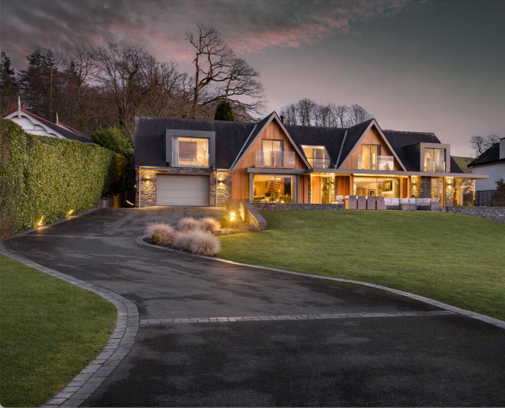 Main image of property: Amberwell, Middle Entrance Drive, Bowness-on-Windermere, LA23 3JZ