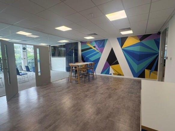 High table and abstract Image on wall.jpeg.jpg