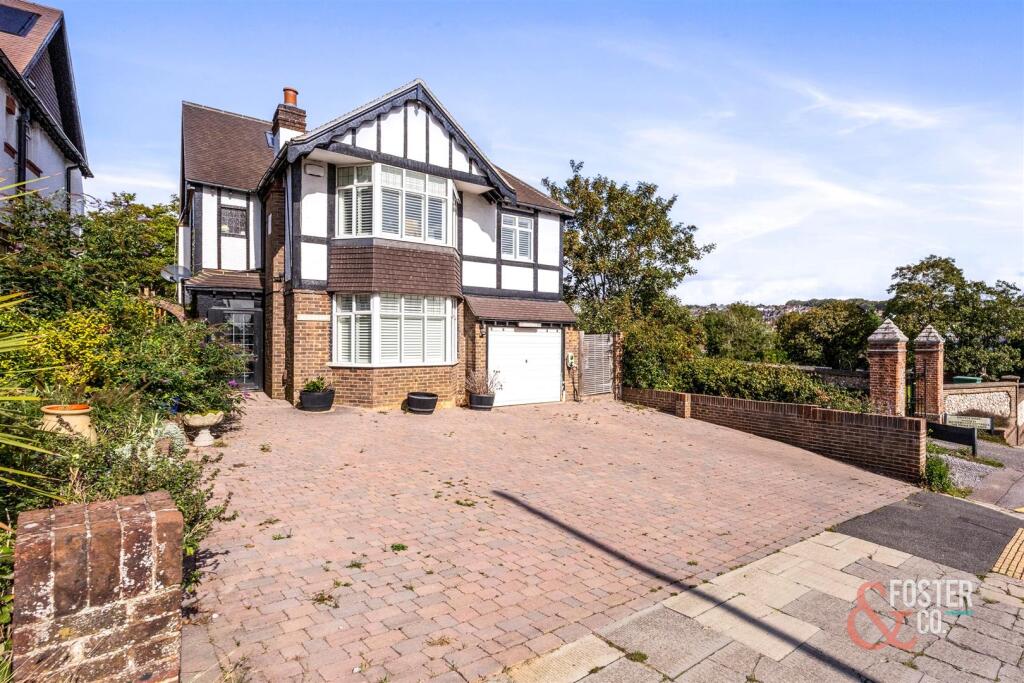 Main image of property: Woodland Drive