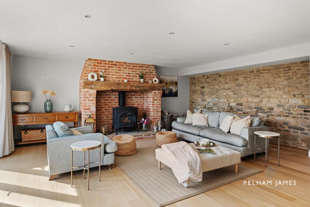Main image of property: Manor Farm Court, Haddon, PE7