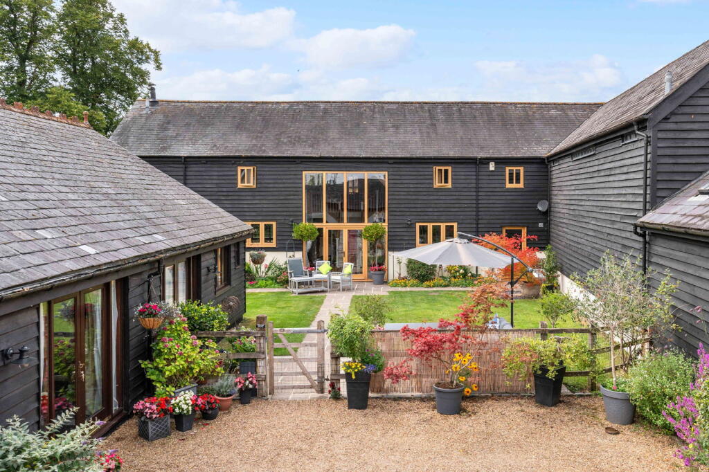 Main image of property: An Exceptional 4 bedroom Barn Conversion with 2 bedroom Annex