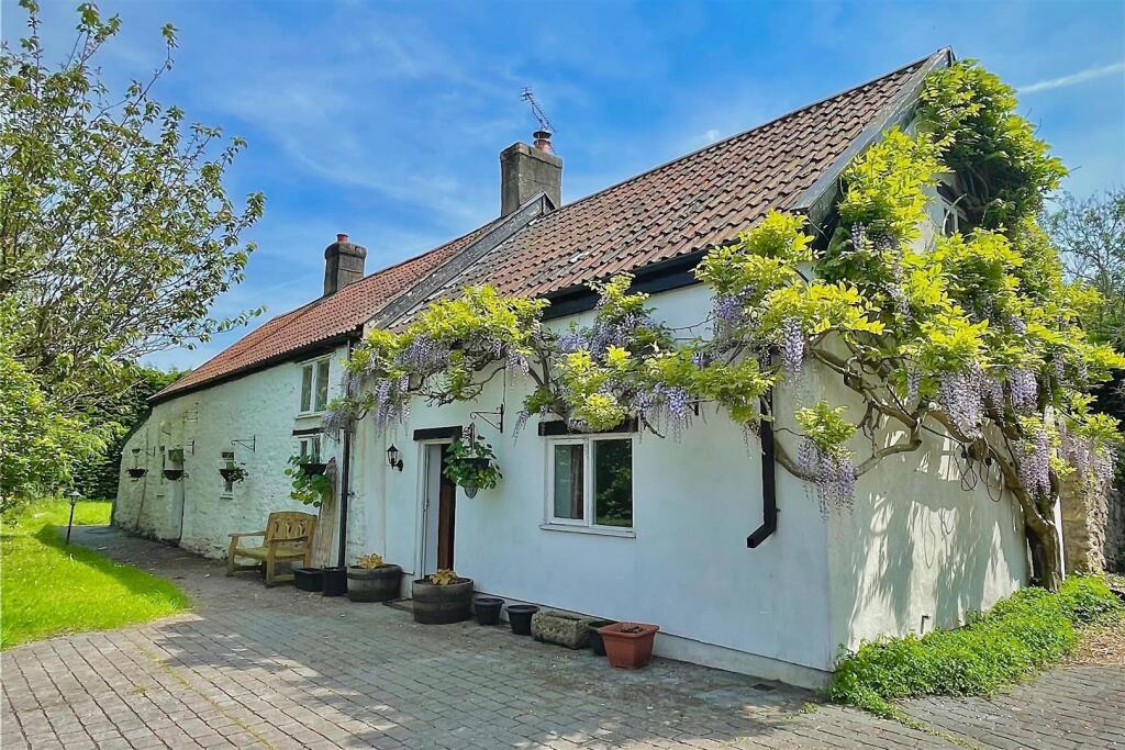 Main image of property: Period cottage nestled away close to Clevedon Town Centre