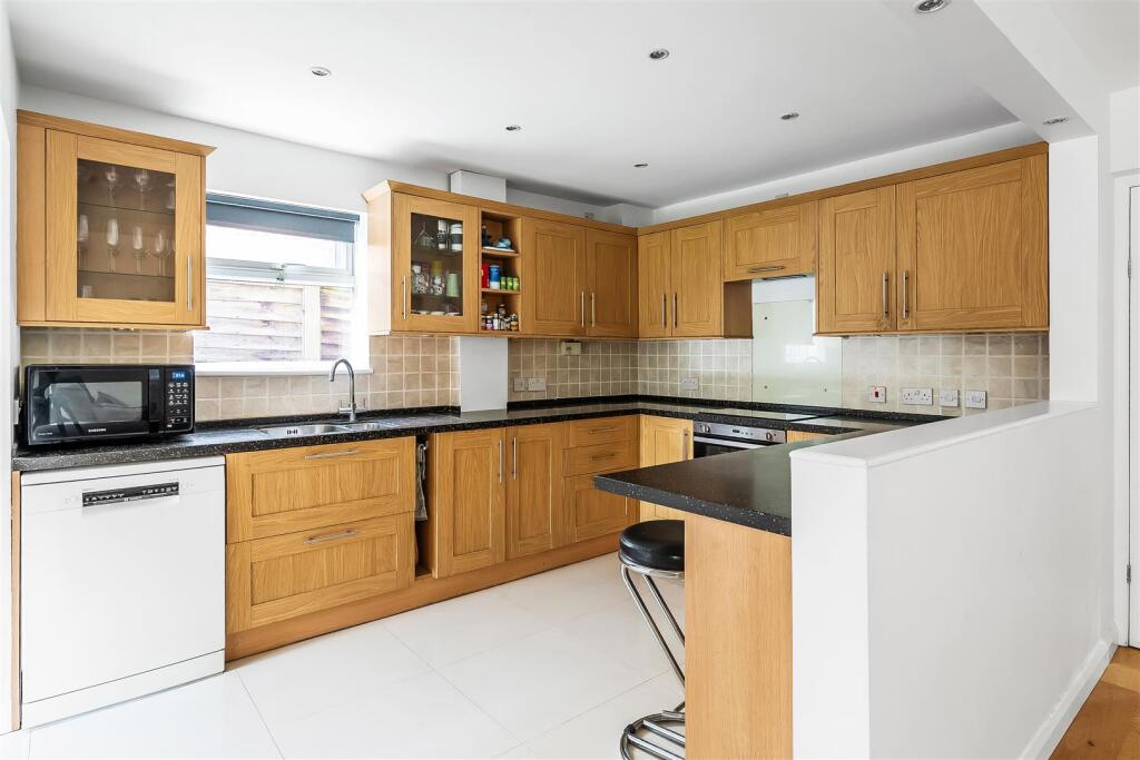 Main image of property: AGATES LANE, ASHTEAD, KT21