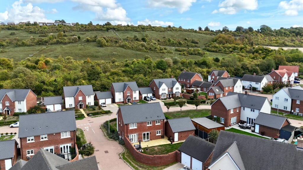 Main image of property: An Attractive Family Home On A Corner Plot & Executive Development - Brickmakers Way