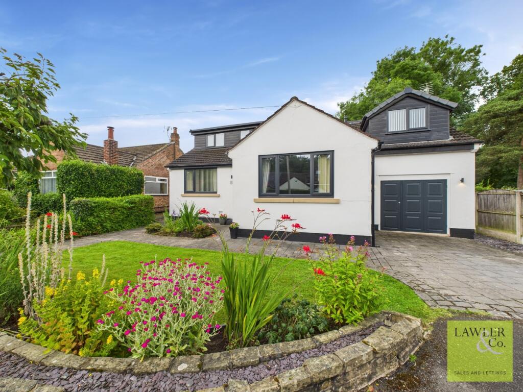 Main image of property: Woodside Drive, High Lane, Stockport, Cheshire, SK6 8HU