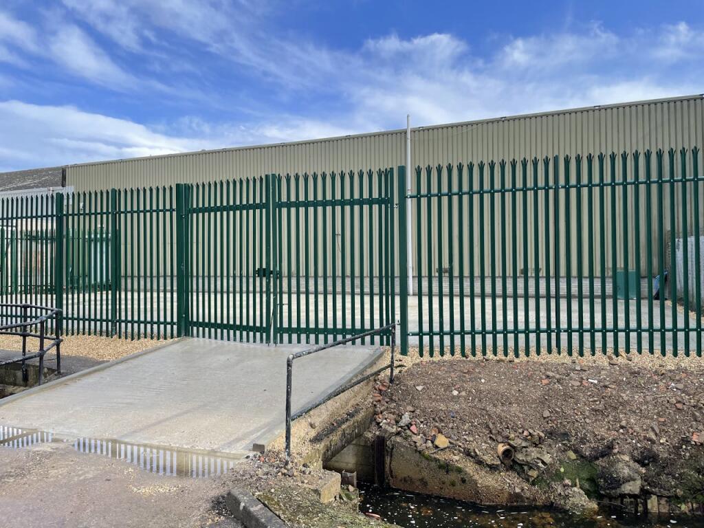 Main image of property: Open Storage Land, Riverway Industrial Estate, Peasmarsh, Guildford, GU3 1LZ
