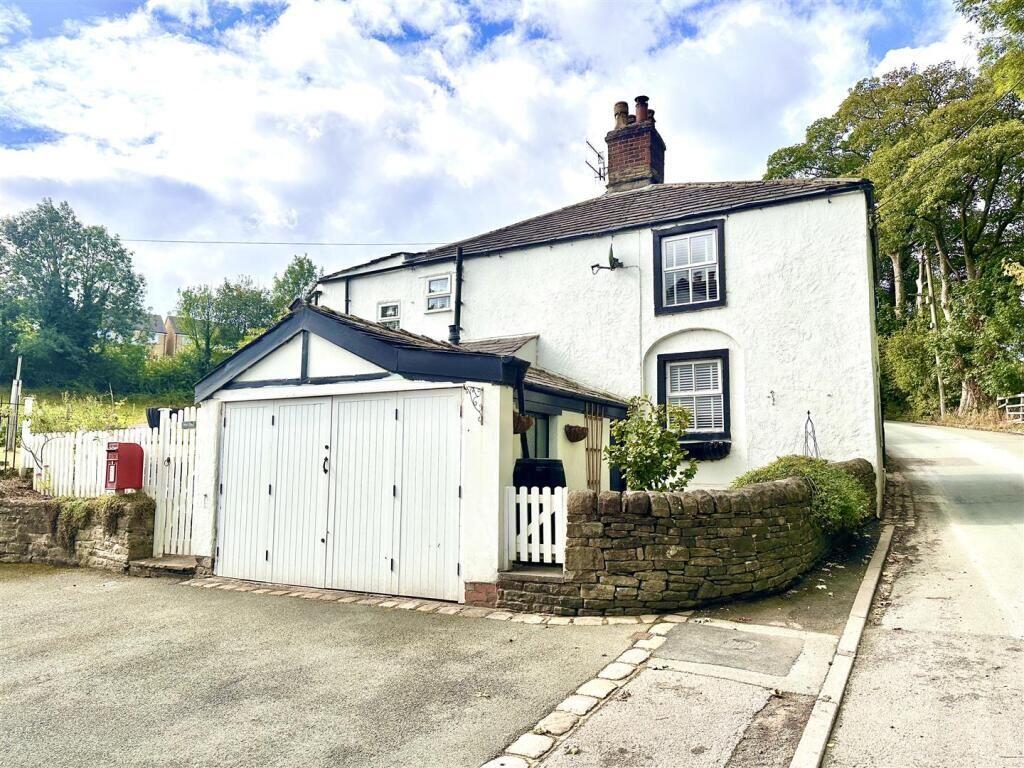 Main image of property: 36 Redhouse Lane, Disley, Stockport, Cheshire, SK12 2ER
