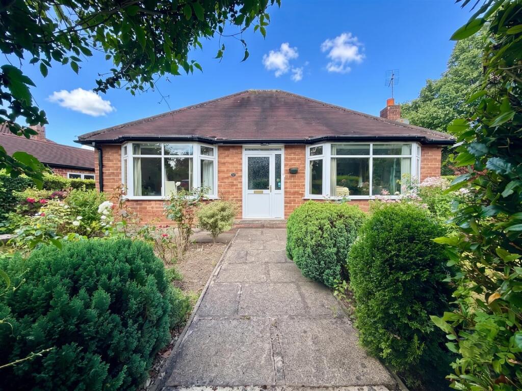 Main image of property: High Elm Drive, Hale Barns, Altrincham