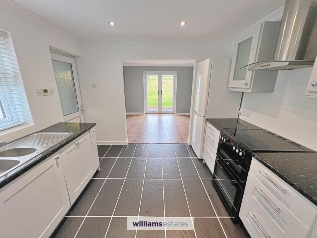 House in Gwernaffield - More