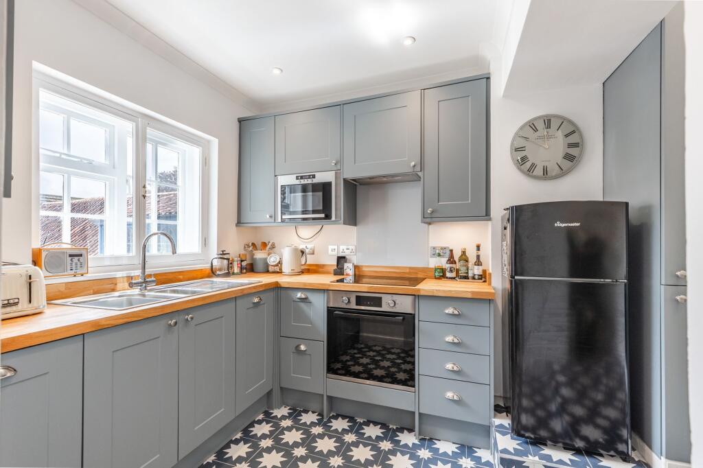 Main image of property: Chain Free Georgian Elegance in the Heart of Holt