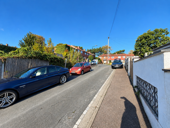Sunlit UK Suburban Street Scene T202610301049.png