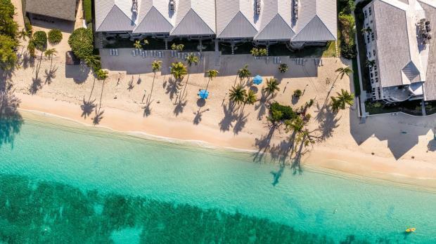 Main image of property: Beachfront Bliss, Cayman Club, Seven Mile Beach, Cayman Islands