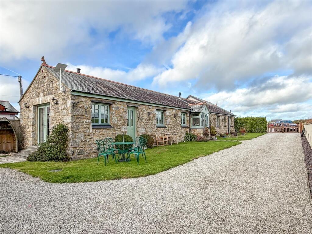 Main image of property: Farms Common, Stunning Barn Conversion
