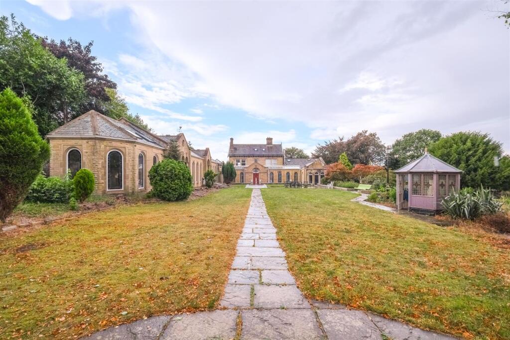Main image of property: Woodhouse Lane, Brighouse