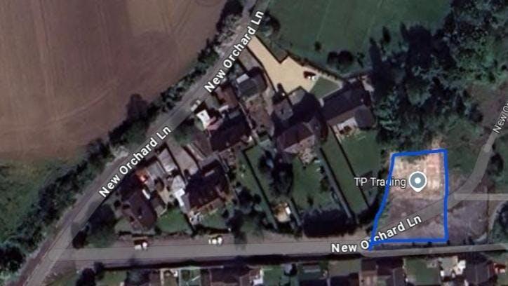New Orchard Lane aerial photo with blue line.jpeg