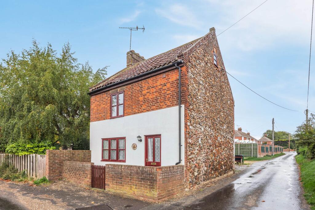 Main image of property: Charming Brick and Flint Cottage in Ringstead