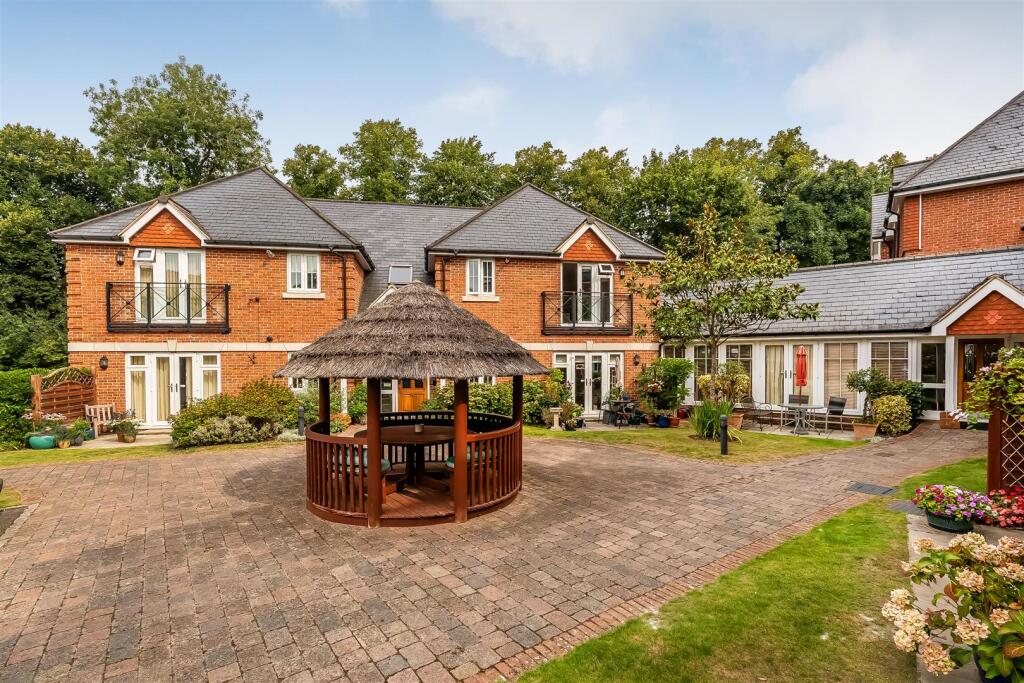 Main image of property: WARREN COURT, ASHFIELD CLOSE, KT21