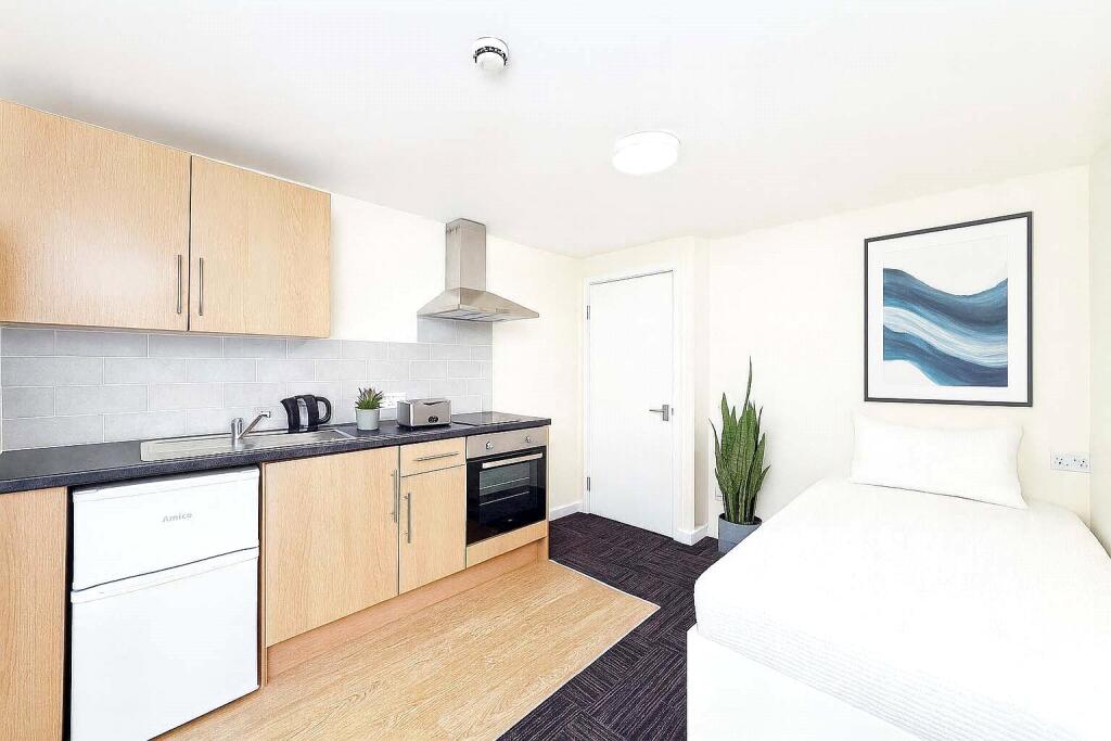 Main image of property: Room 8, 5a Church Street, Esher, Surrey, KT10