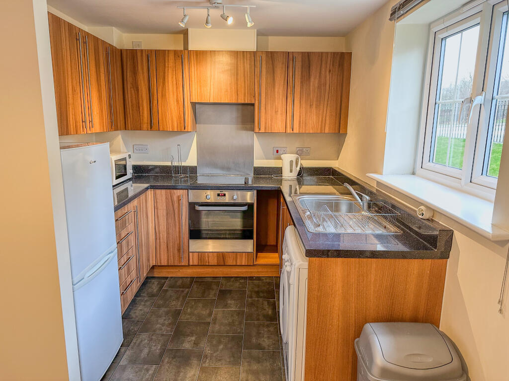 Main image of property: Woodside Court, Middleton, Leeds, LS10 4US