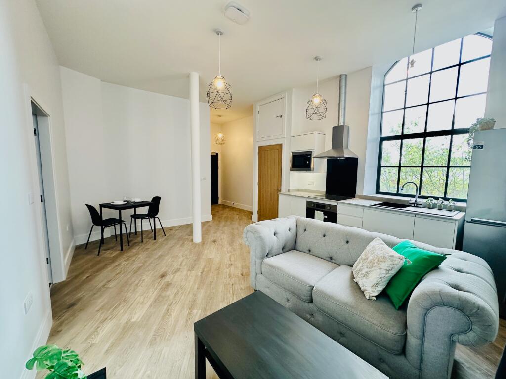 Main image of property: Woolpack Mills, Maiden Lane