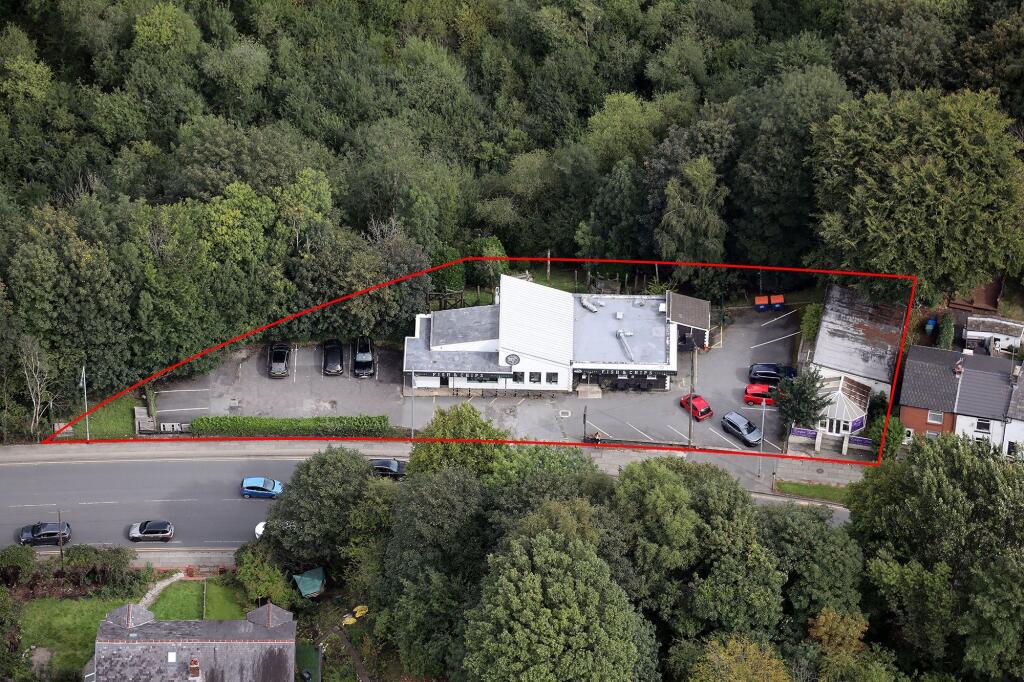 Main image of property: 825 & 825a Manchester Road, Bury, Greater Manchester BL9 9TP