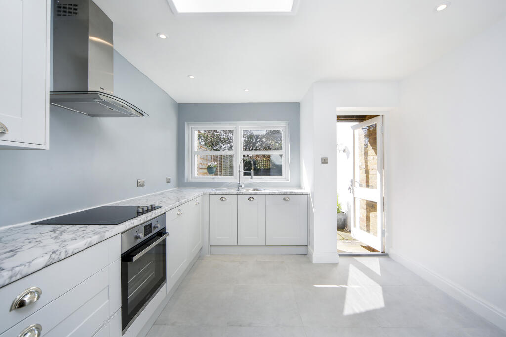 Main image of property: New Road, Weybridge, KT13